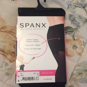 Brand new Spanx black tights size. B